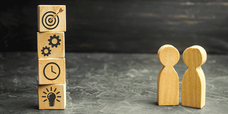 wooden blocks discussing strategies